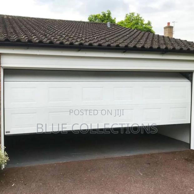 9×8 Automated Garage Door With Fanlight · Photo 2