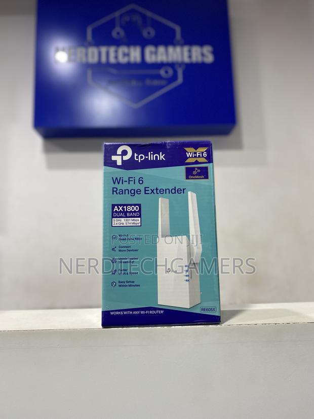 Tp-Link Ax1800 Wifi 6 Extender(Re605x)-Internet Booster. · Photo 1