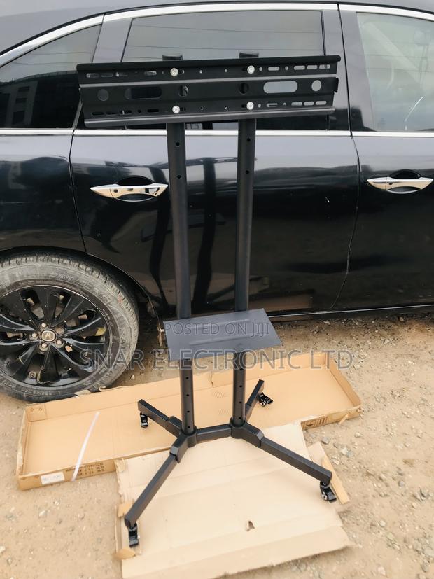 Affordable Mobile TV Stand Rolling Movable for Most 32"-70 · Photo 1