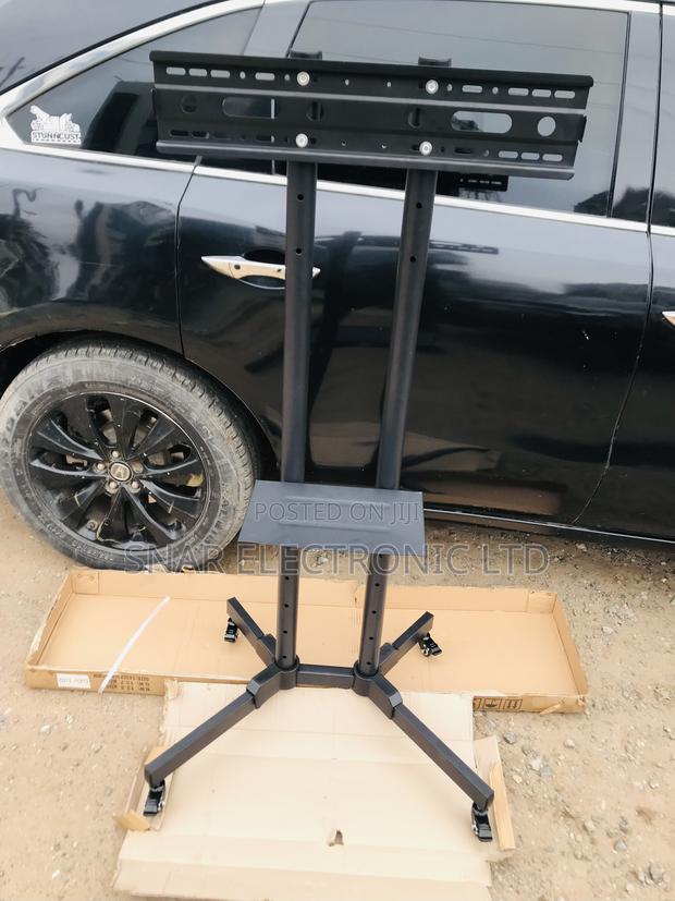 Highly Affordable Mobile TV Stand Rolling Movable for 32-70 · Photo 1