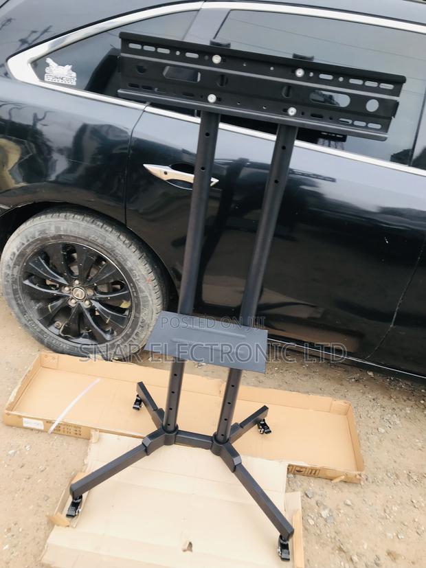 Adorable Mobile TV Stand Rolling Movable for Most 32"-70 · Photo 1