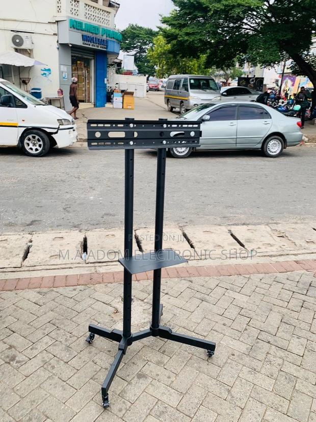Long Lasting Mobile Tv Stand With Wheels for 32-70” Tv. · Photo 1