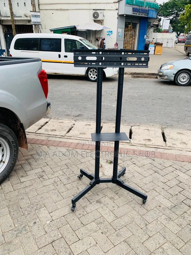 Authentic Mobile Tv Stand With Wheels for 32-70 Tv(Black). · Photo 1