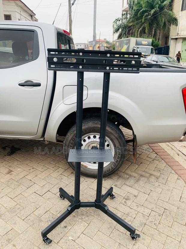 Shop Affordable Mobile Tv Stand With Wheels for 32”-70” Tv. · Photo 1
