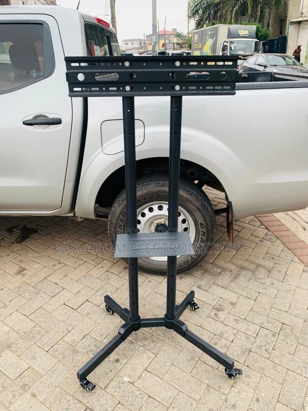 Shop Adorable Mobile Tv Stand With Wheels for 32”-70” Tv. · Photo 1