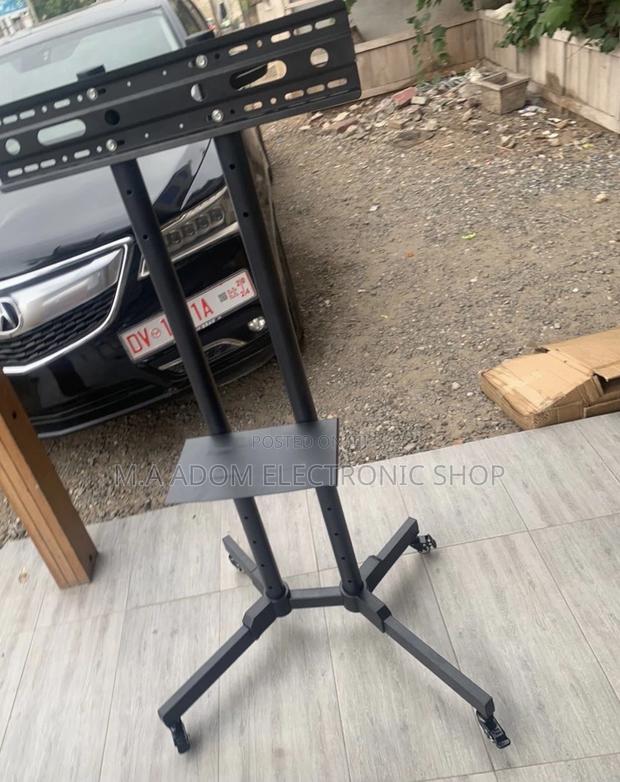Shop Durable Mobile Tv Stand With Wheels for 32”-70”,Black. · Photo 1