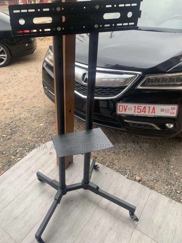 Purchase Affordable Moveable Tv Trolly for 32”-70” Tv. · Photo 1