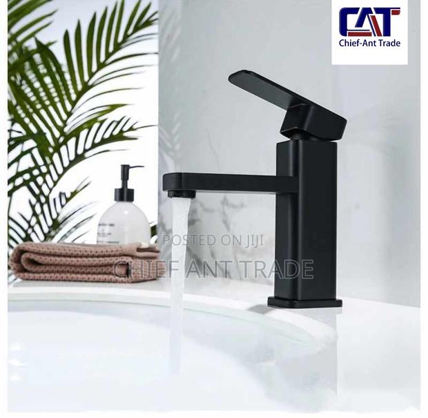 Tap / Faucet. Hot Cold. · Photo 1