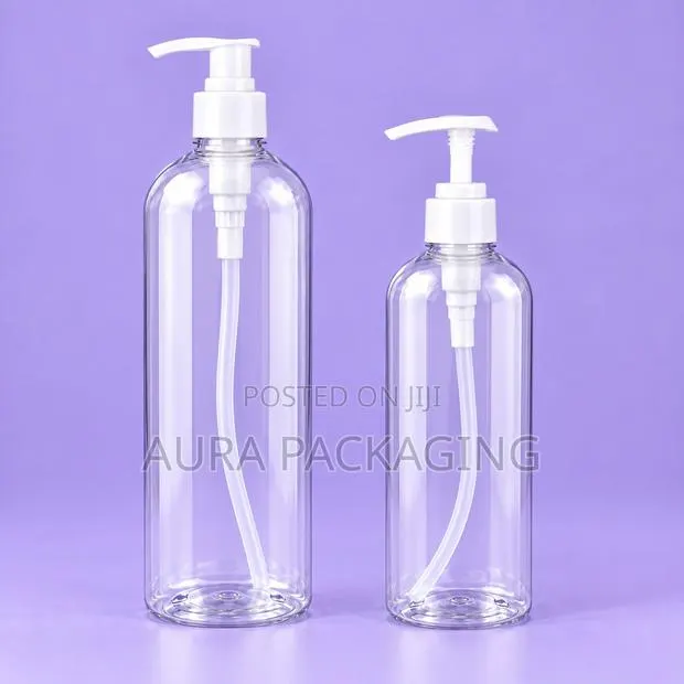 Clear Lotion and Shampoo Bottles With White Pump · Photo 1