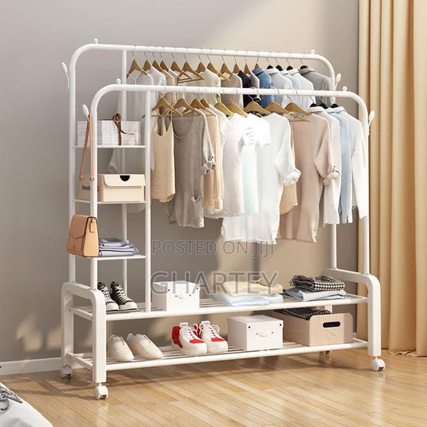 Double Metal Hanging Rail Clothes Rack With Shelves White · Photo 1