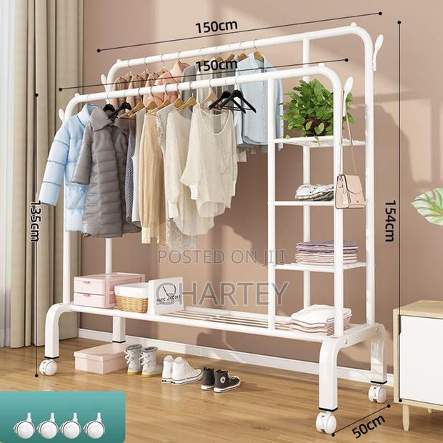 Double Metal Hanging Rail Clothes Rack With Shelves White · Photo 2