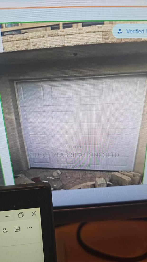 9ft X 8ft Automated Garage Door System · Photo 2