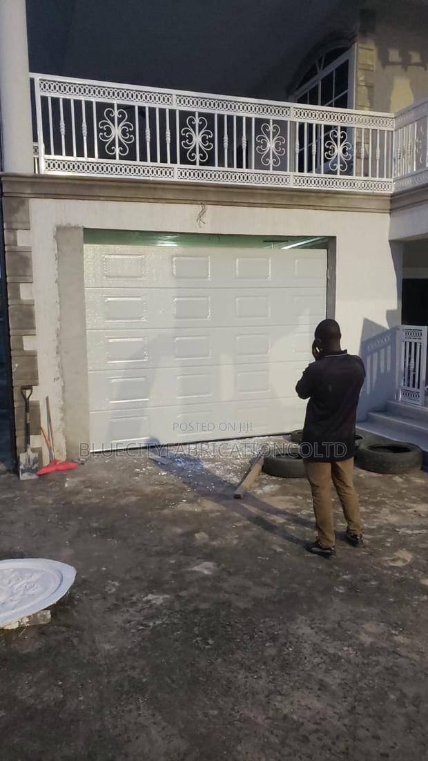 Wooden Color Remote Control Door System · Photo 1