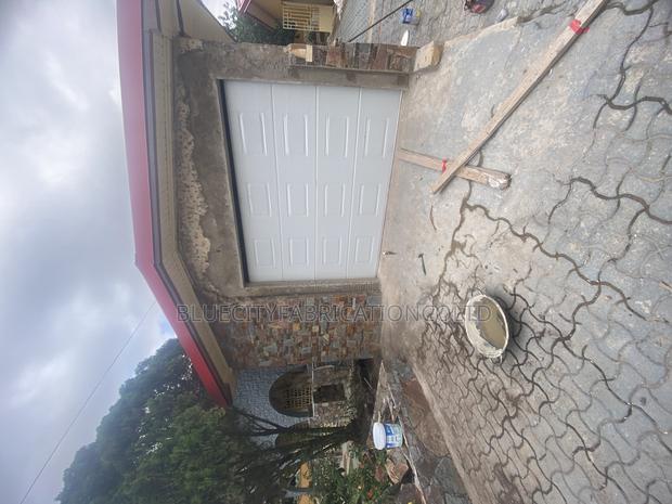Remote Control Automatic Garage Doors · Photo 1