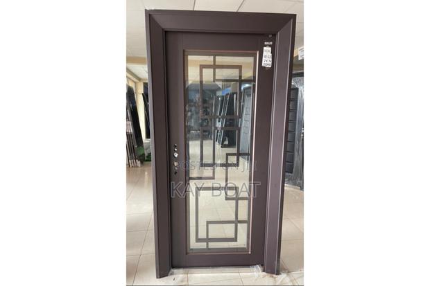 A Harmonious Glass Metal Door · Photo 1