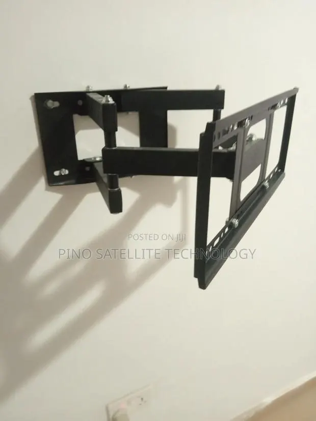 Tv Wall Mount. Adjustable 32-70-85 Inches Tv · Photo 1