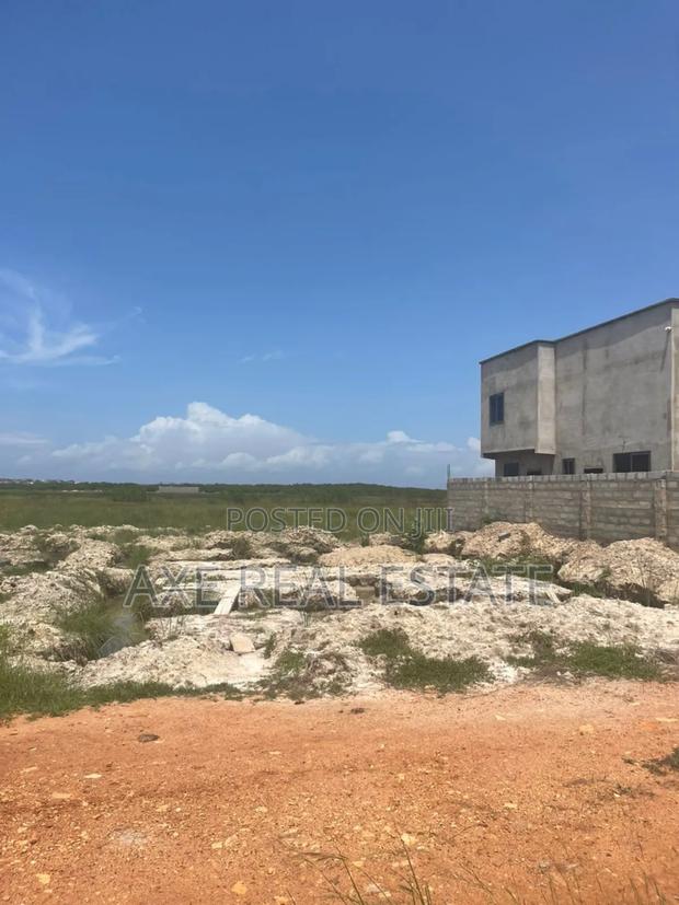 Awesome Positioned Gated Half Plot > Prampram Beach Road · Photo 1