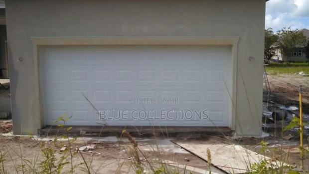 14×8 Automated Garage Door · Photo 1