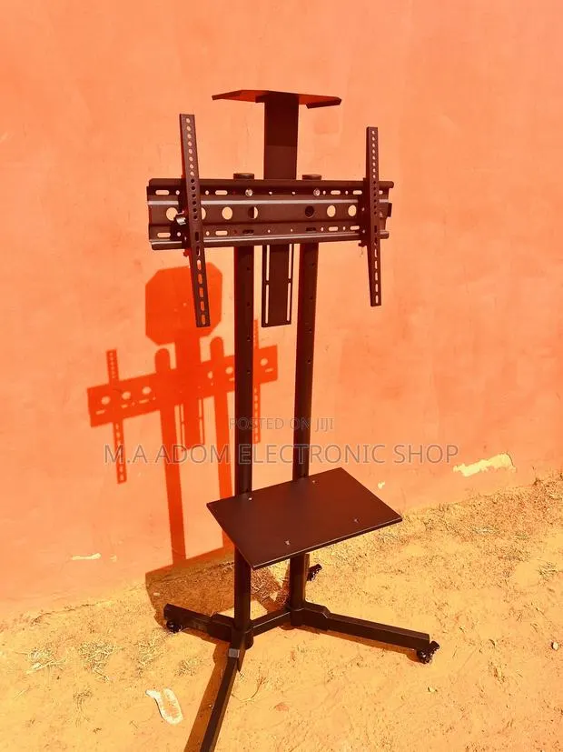 Tv Stand With Tilting Wall Mount · Photo 1