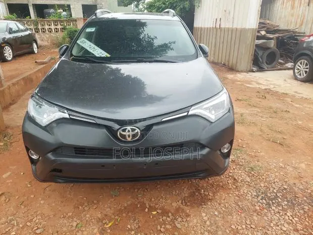 Toyota RAV4 LE 4dr SUV AWD (2.5L 4cyl 6A) 2014 Black · Photo 1