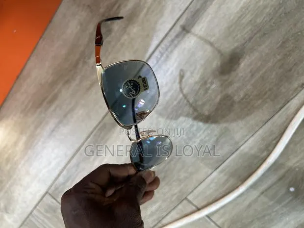 Rayban Gold Metal-frame Sunglasses · Photo 1