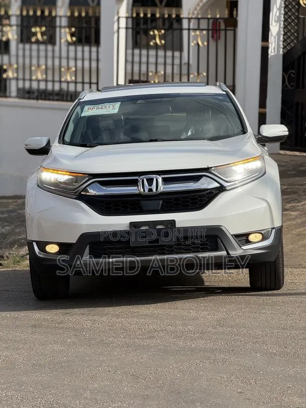 Honda CR-V Touring AWD 2019 White · Photo 1