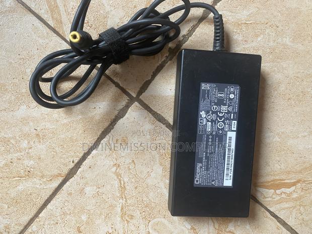 Original Chicony AC Adapter 20v=6.75A, 135w · Photo 1