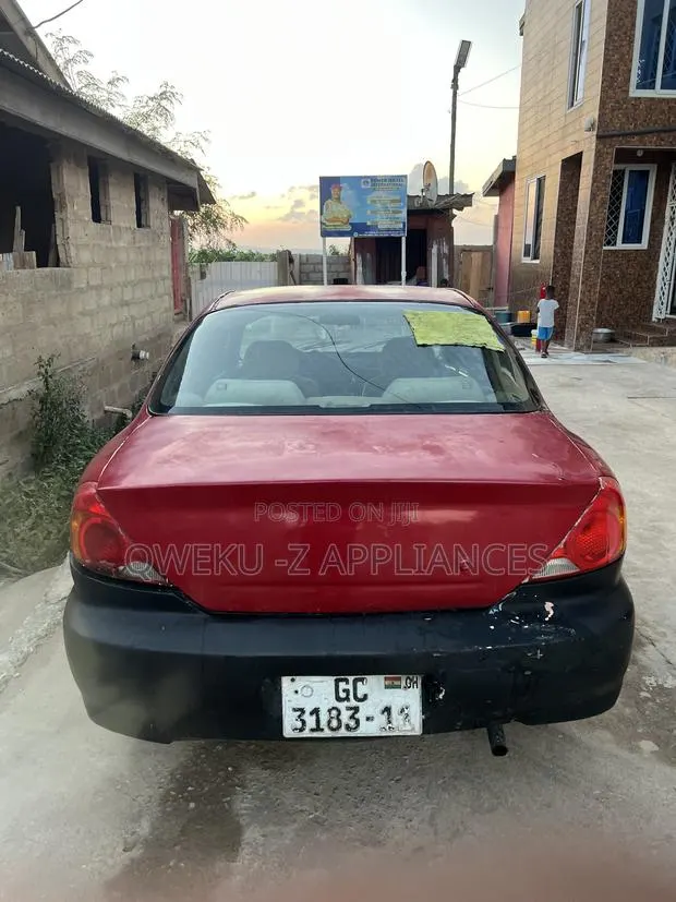 Kia Spectra 2001 Red · Photo 1