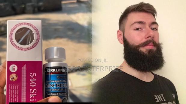 Kirkland Minoxidil Derma Roller Growth Oil · Photo 1