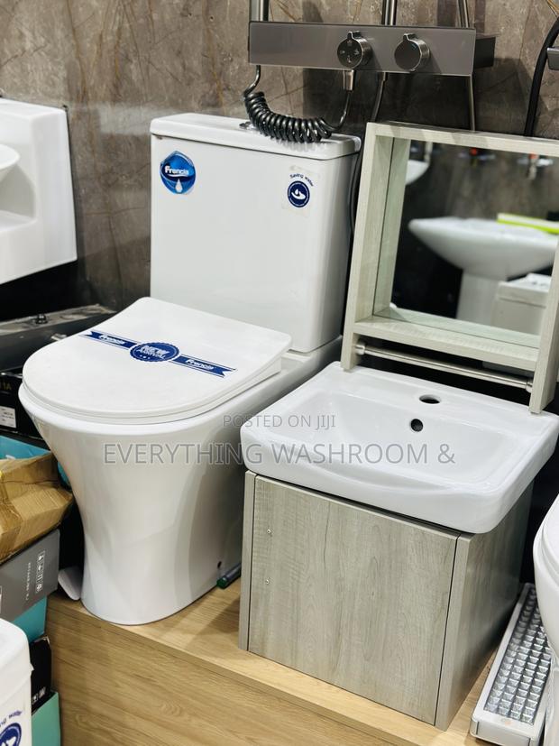 Slim Tank Water Closet and Cabinet Basin Set · Photo 1