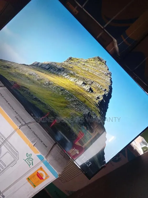 TCL 55 Qled Television With Sleek Design to Fit Any Angle in a Room · Photo 1