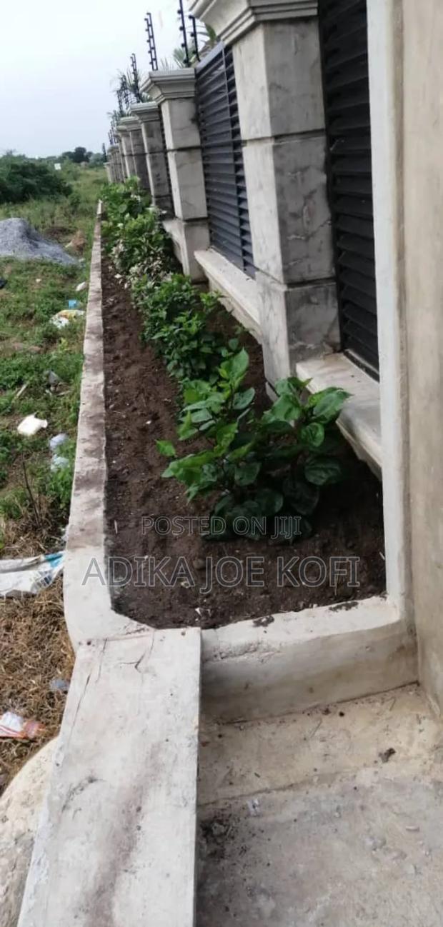 Landscaping by Joefel Construction Decor · Photo 1