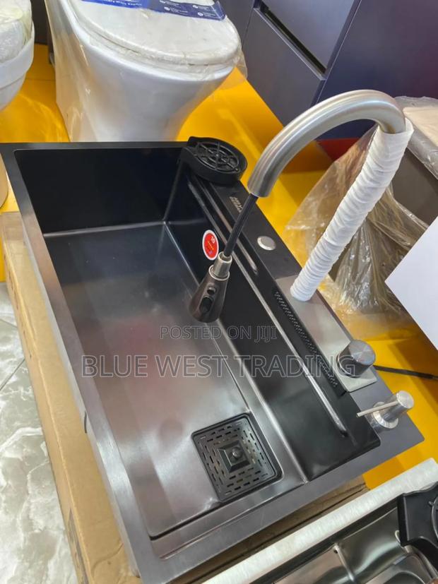 Black Waterfall Cabinet Sink · Photo 4