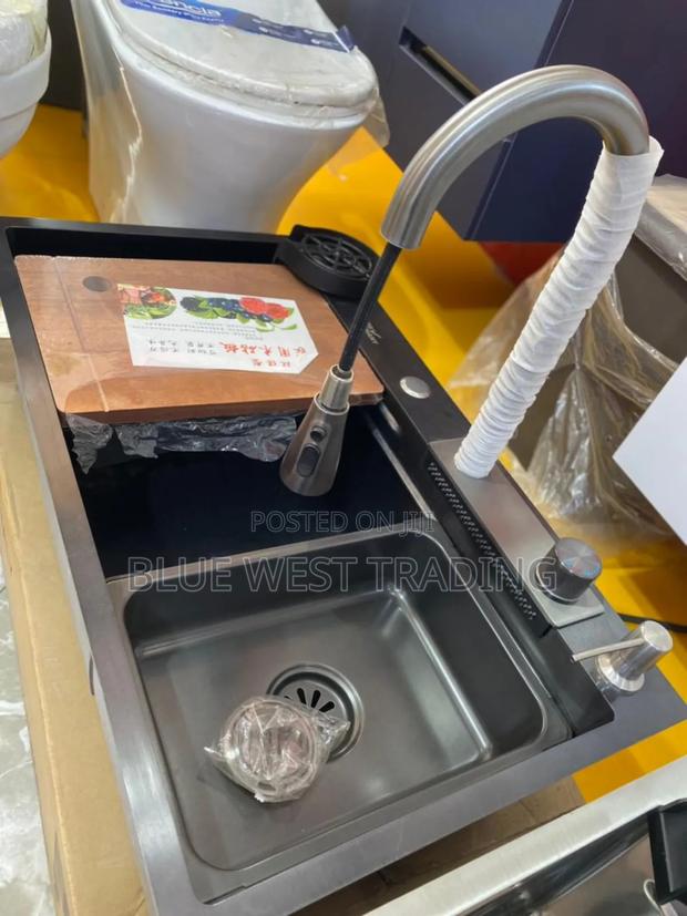 Black Waterfall Cabinet Sink · Photo 7