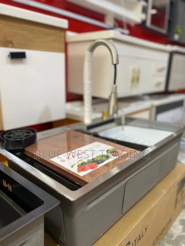 Grey Luxury Waterfall Cabinet Sink · Photo 1