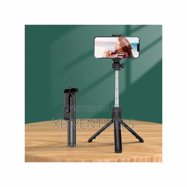 Bluetooth Selfie Stick Tripod + Shutter Remote Control · Photo 2