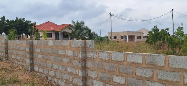 Neatly Leveled Half Plots at Prampram Beach Road · Photo 1