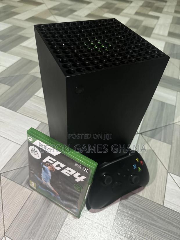Microsoft Xbox Series X and FIFA 24 CD · Photo 7