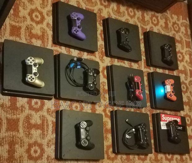 Ps4 Slim+fifa and Pes 27 With 5 Games.