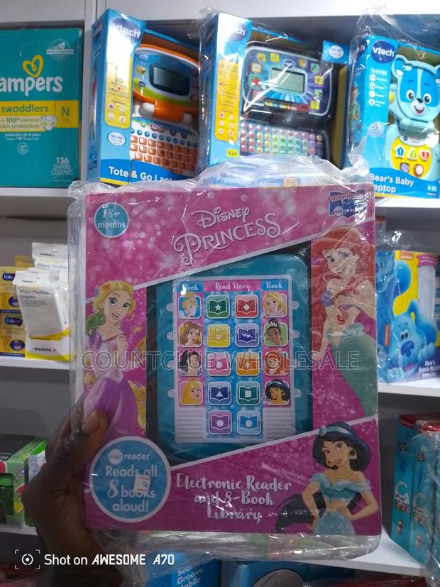Disney Electronic Reader and 8-Book Library · Photo 1