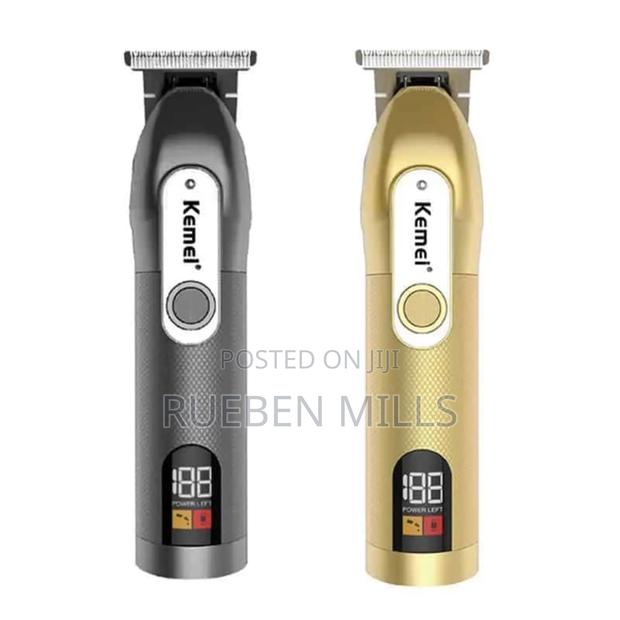 Black and Gold Kemei Clipper Barbering Machine Beard Trimmer · Photo 1