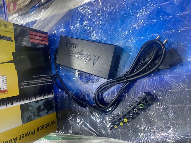 Universal Notebook Power Adapter With 8 Swappable Connectors · Photo 1
