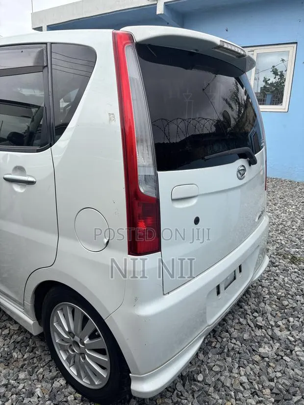 Daihatsu Move 2009 White · Photo 1