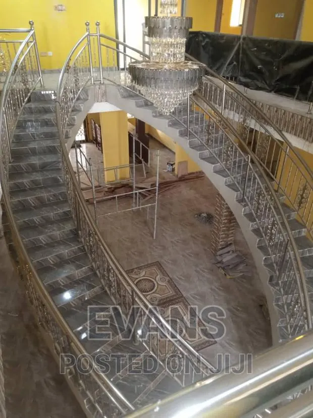 We Do Quality Tilling, Screeding and Wallpaper Installation · Photo 1