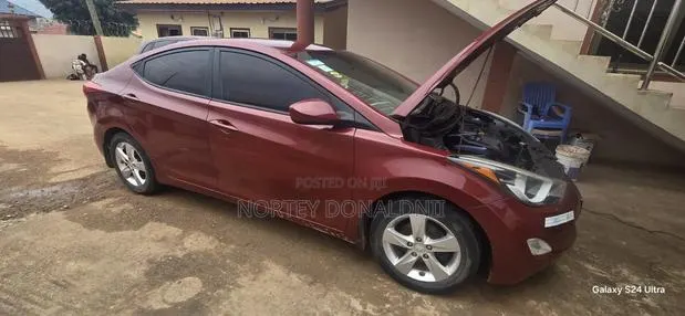 Hyundai Elantra GLS Sedan FWD (1.8L 4cyl 6A) 2013 Maroon · Photo 1