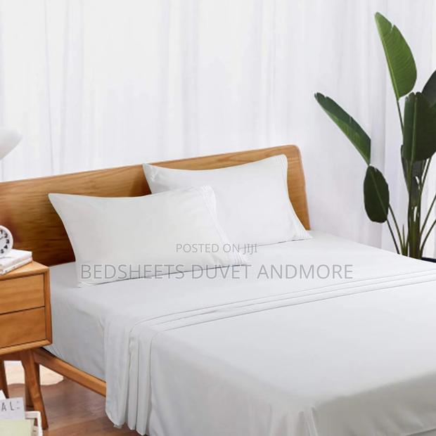 Hotel White Bedsheet · Photo 1