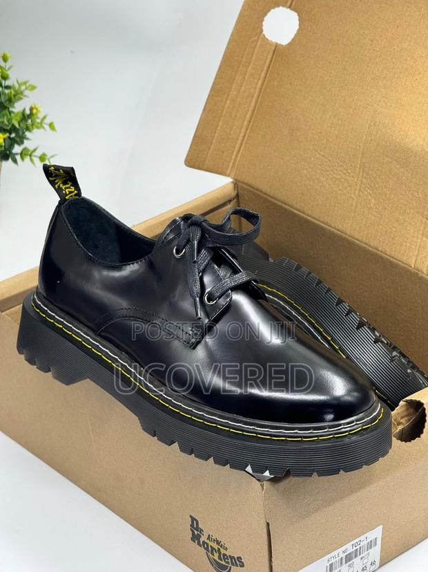 Dr Martens Real Leather Boots · Photo 1