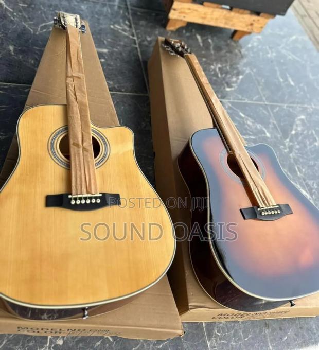 Yamaha and Givson Acoustic Guitar · Photo 1