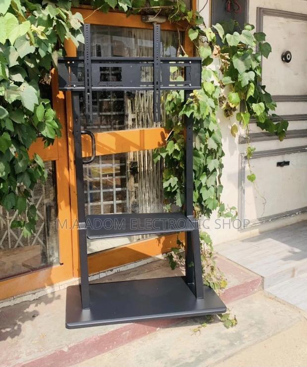 Classic Heavy Duty Mobile Tv Stand With Wheels for 32-100” · Photo 1