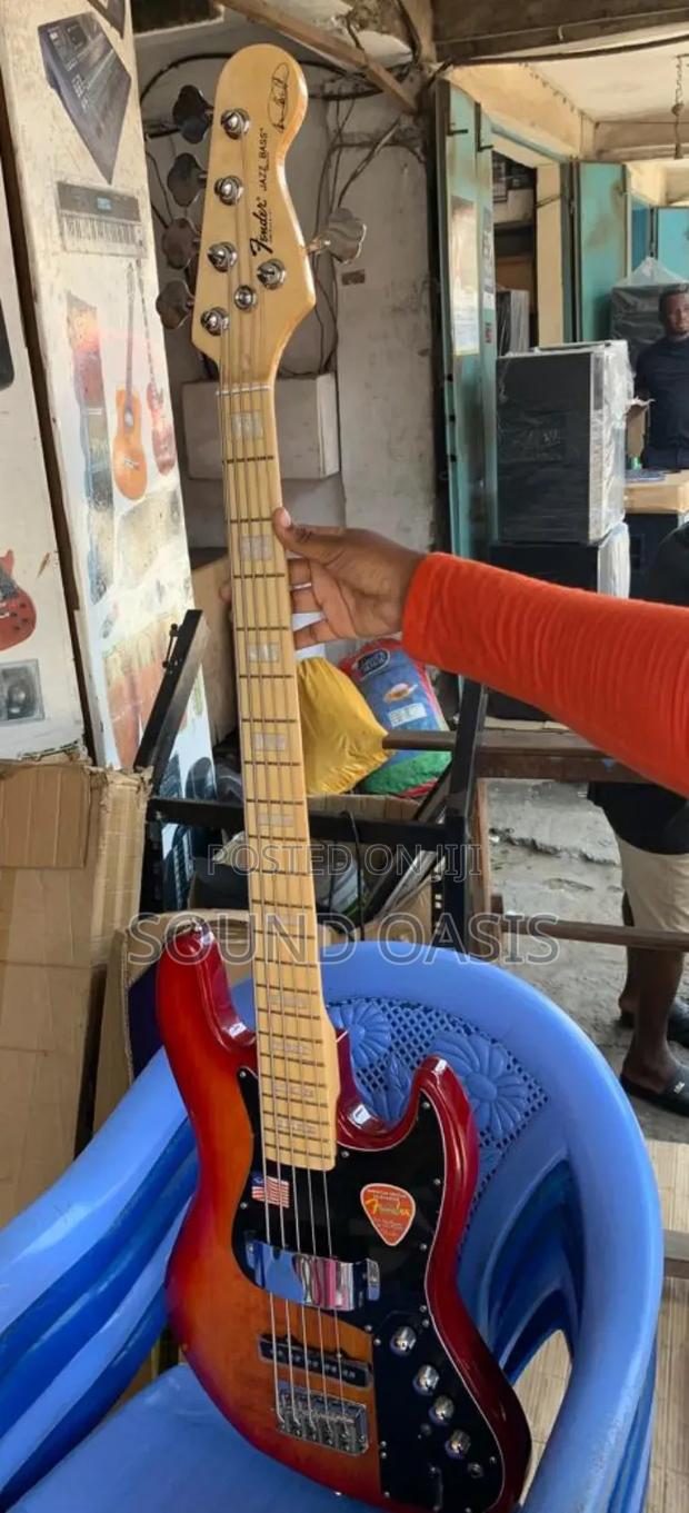 Fender Active Jazz Bass Guitar (Wooden Red) · Photo 1
